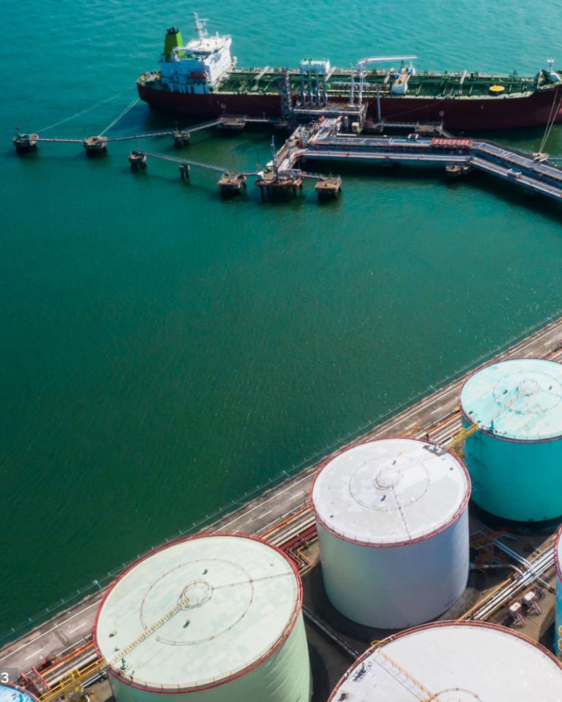 Aerial view of Oil tanker in industrial port at unloading of bulk contents in Tsing Yi